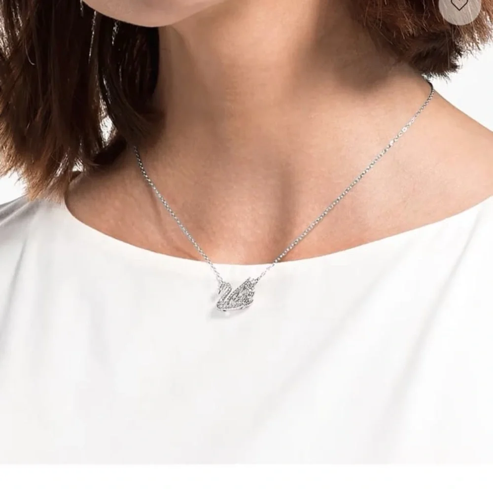 - Swan necklace white rhodium plated from swarovski